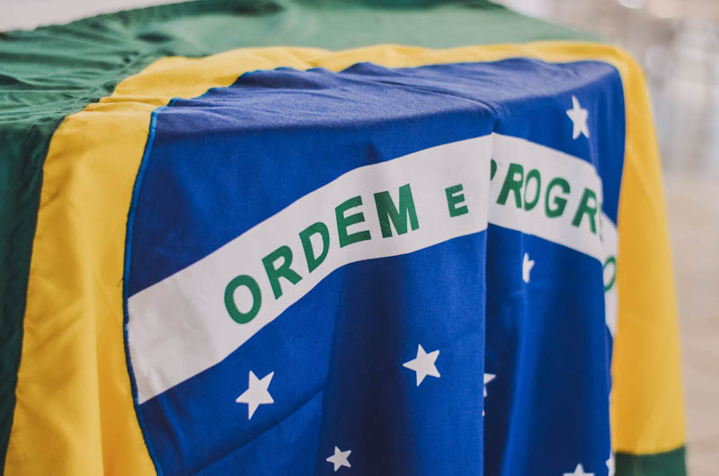 The Brazilian flag with the national motto “Ordem e Progresso” (“Order and Progress”).