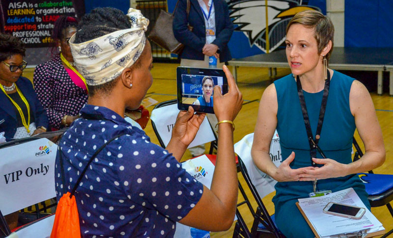Kim being interviewed prior to opening the inaugural Association of International Schools in Africa Invitation Conference (AISA AIC) in 2019.
