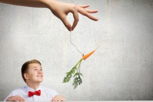 Traditional student motivation and engagement has been all about offering students “carrots” or rewards for their desirable behavior, and “sticks” or  negative consequences for their undesirable behavior.