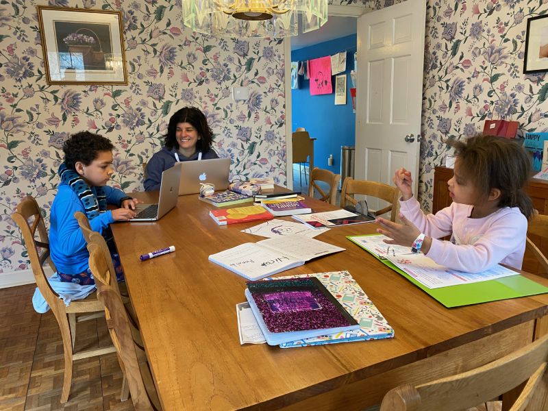 Author Sarah Thomas and her children share the dining room table during the lockdown.